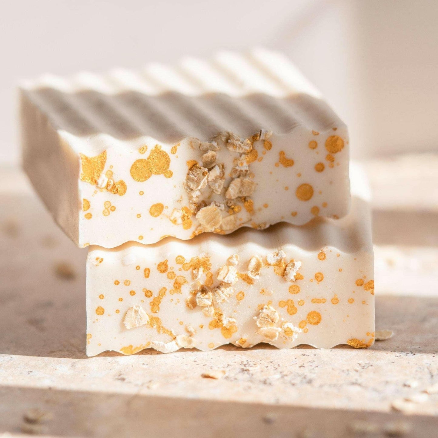 Oatmeal Milk and Honey soap bars with gold flakes, highlighting natural textures and handcrafted design. Gift For Her